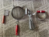 Lot of misc kitchen utensils including red handle