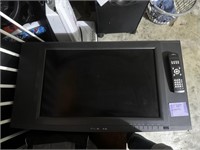 Flat Screen TV Olivia brand with remote. Works