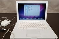 Apple MacBook Model #A1181 Laptop. Works. Needs