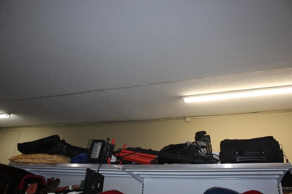 Shelf of Items - Flood Light, bags, etc.