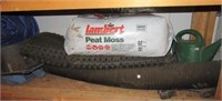 Peat moss, Watering can, shop rubber mat, tarp,
