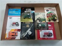 assortment of 1/64 scale tractors and implements