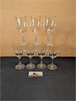 7 gold rimmed wine glasses