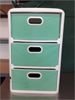 Plastic and canvas storage drawers