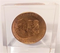 Le Grand David bronze coin in Lucite