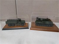 Model Military Vehicles in Display Cases