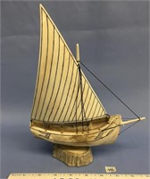 8 1/2" x 10 1/2" carved fossilized bone sailboat,