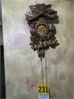 COO-COO CLOCK WITH CROSS RIFLES ON TOP W/2 CHAIN