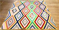 Vintage hand stitched diamond pattern quilt