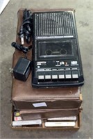 Cassette tapes, player, and 2 cases