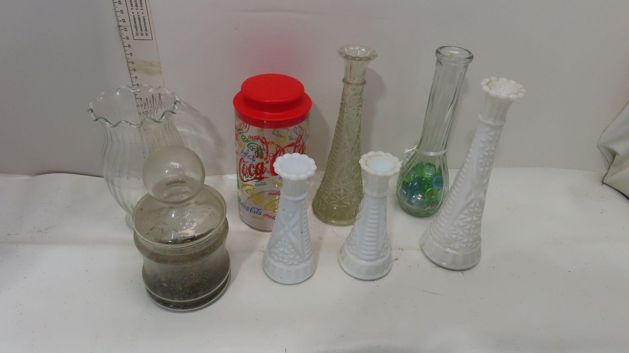 assorted vases, Coca-Cola jars