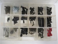 Assorted AR-15 parts in organizer.