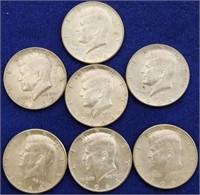 Seven 1964 Kennedy Silver Half Dollars