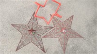 2 metal decorative stars (24") and 1 PVC whirly gi