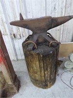 Vintage marked anvil w/ wood block