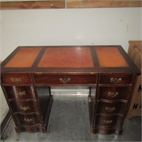 Leather top mahogany desk.