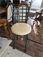 Beautiful heavy wrought iron swivel bar chair.