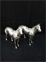 Pair of vintage metal horse figurines