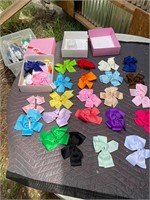 40 clip on hair bows new- 2 boxes of 20