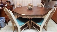 48" octagon dining table with four chairs, two