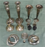 Collection of sterling weighted candlesticks, vase