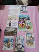 Group of used postcards and a dinosaur hunting