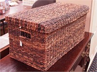 Woven chest with hinged lid, 32" long x 15" high