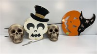 Pumpkin yard decor, styrofoam skulls, skull