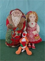 Handmade fabric Santa and girl with heart basket.