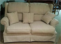 Two seat couch, pastel tweed, with throw pillows