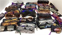 Large lot of sunglasses and reading glasses.