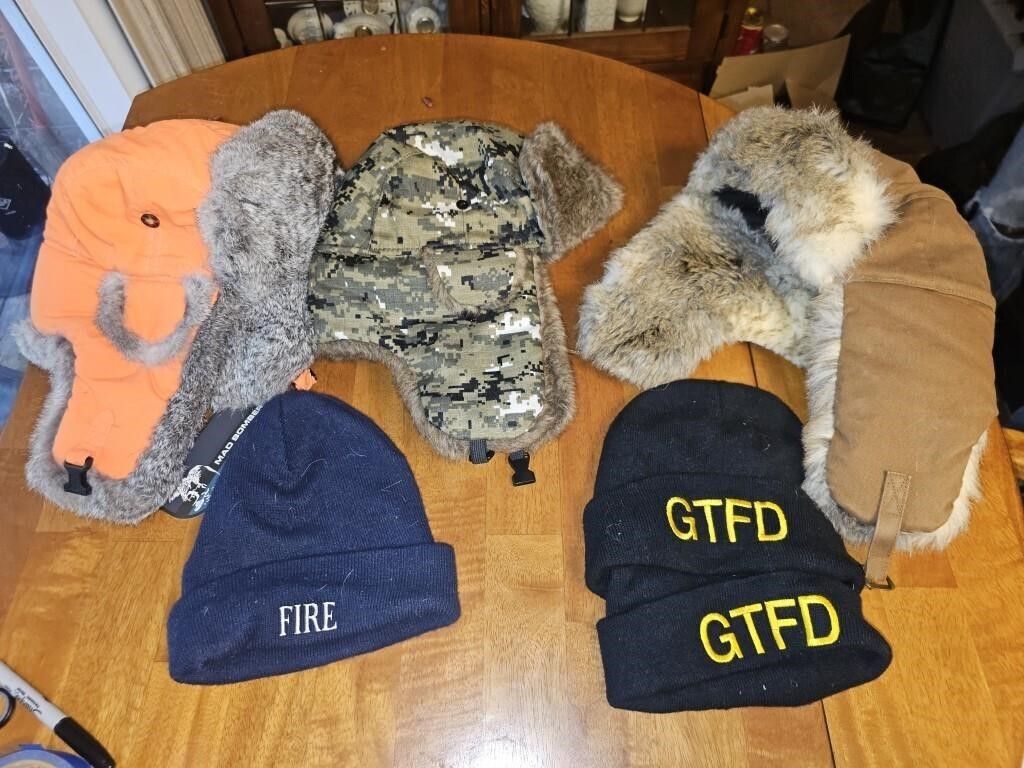 Lot of cold weather hats. Fire Dept hats 6 total.