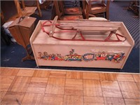 Two children's vintage items: 40" long sled and