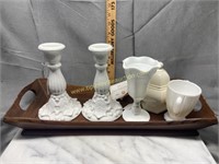 Candle holders, milk glass and creamer on wood