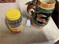 Beer stein and bottles of bolts