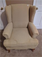 Gold wingback chair