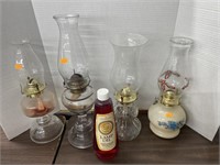 4 vintage oil lamps w/ oil