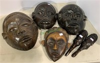 6 carved wood African masks - the largest