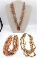 3 Vintage Multi Strand Amber Colored Necklaces