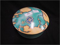 Covered china box marked Designed Exclusively