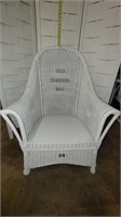 white whicker arm chair