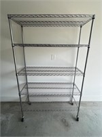 Chrome Metal Shelf on Casters. 76 tall x 47 x 18