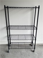 Metal Storage Shelf on casters. 58 tall x 36 x 14