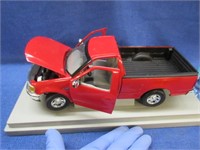 1997 red ford diecast truck (1/18 scale)