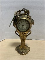 Art Nouveau gold metal clock 8 inches high