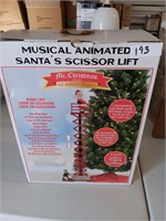 Musical animated santa's scissor lift