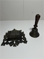 Brass Bell and a cast iron wall pocket