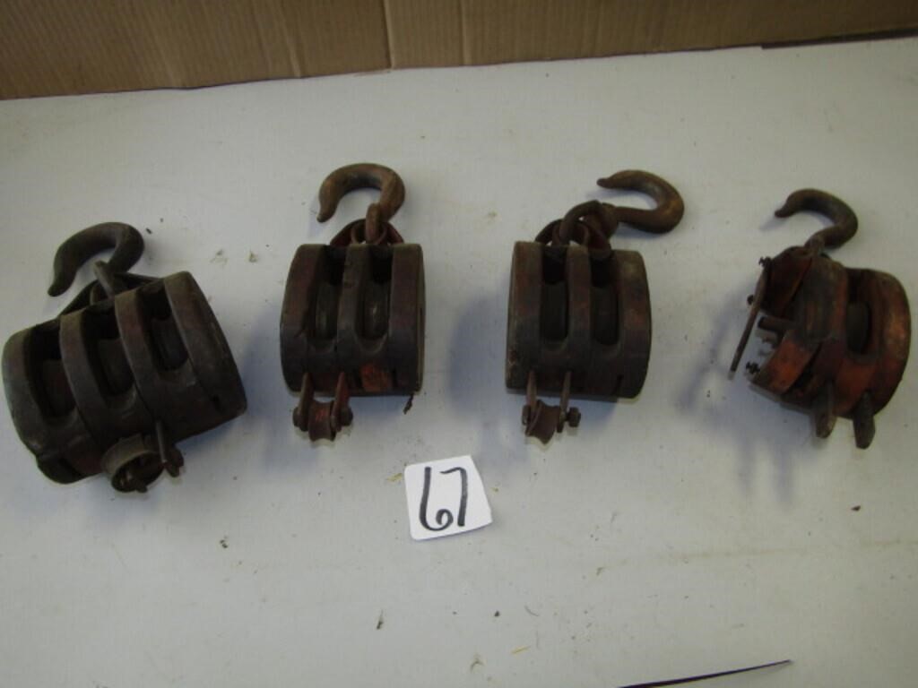 4 WOOD PULLEYS