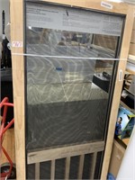 Screen door with torn mesh
