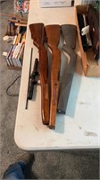 Assorted gun stocks with scope and cleaning rod